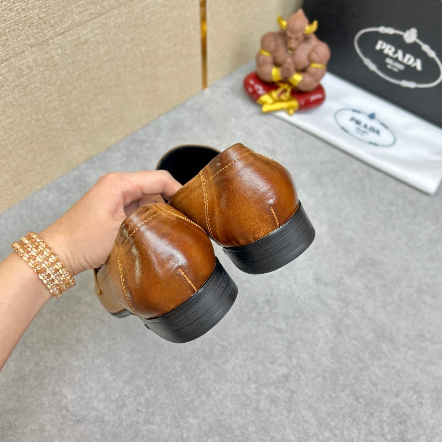 Pra*a Brushed Leather Loafer Plate Bit Logo Brown