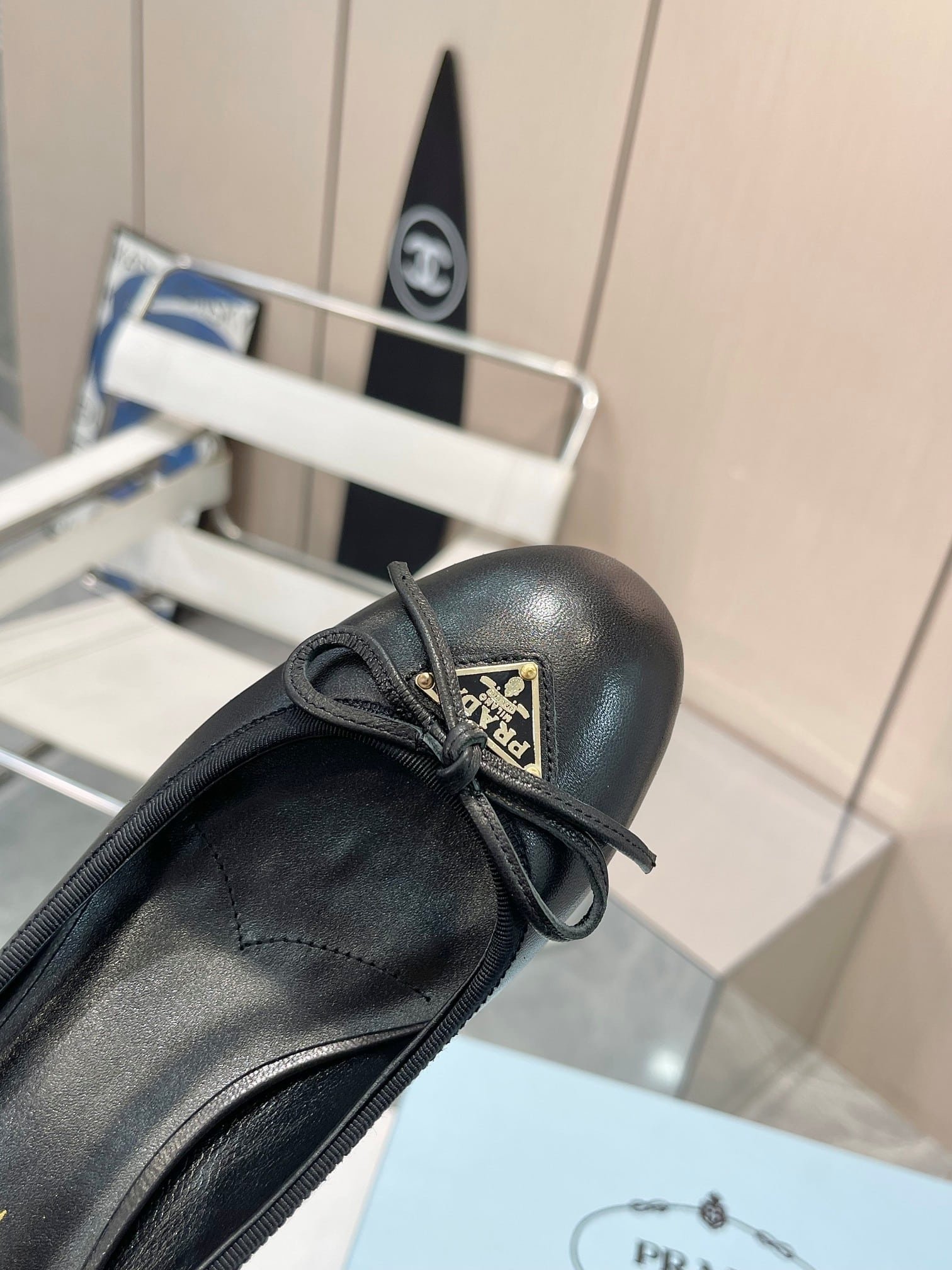 Pra*a Triangle Logo Bow Pump In Black