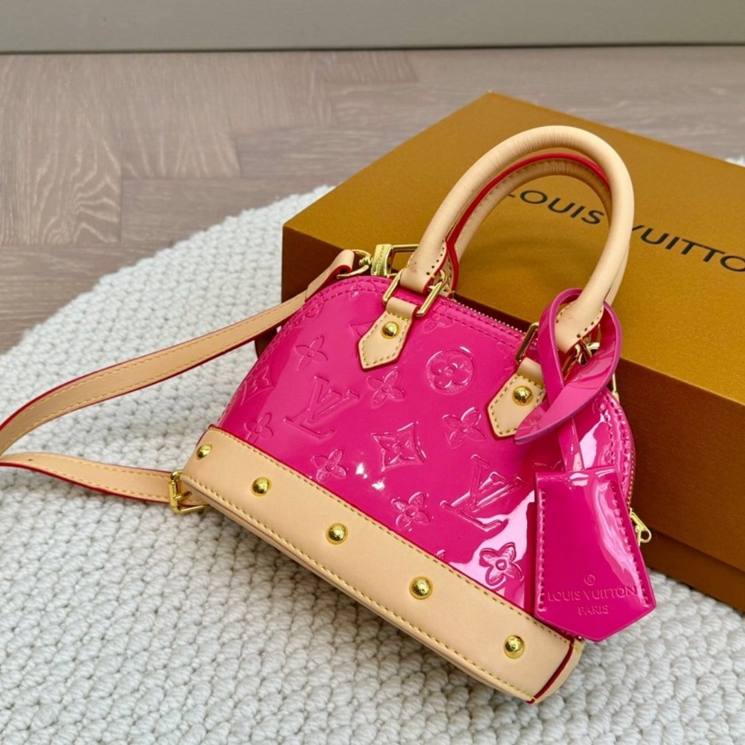 L0vis Vvtt0n Alma Nano Monogram Vernis Embossed Neon Pink 18Cm M90611