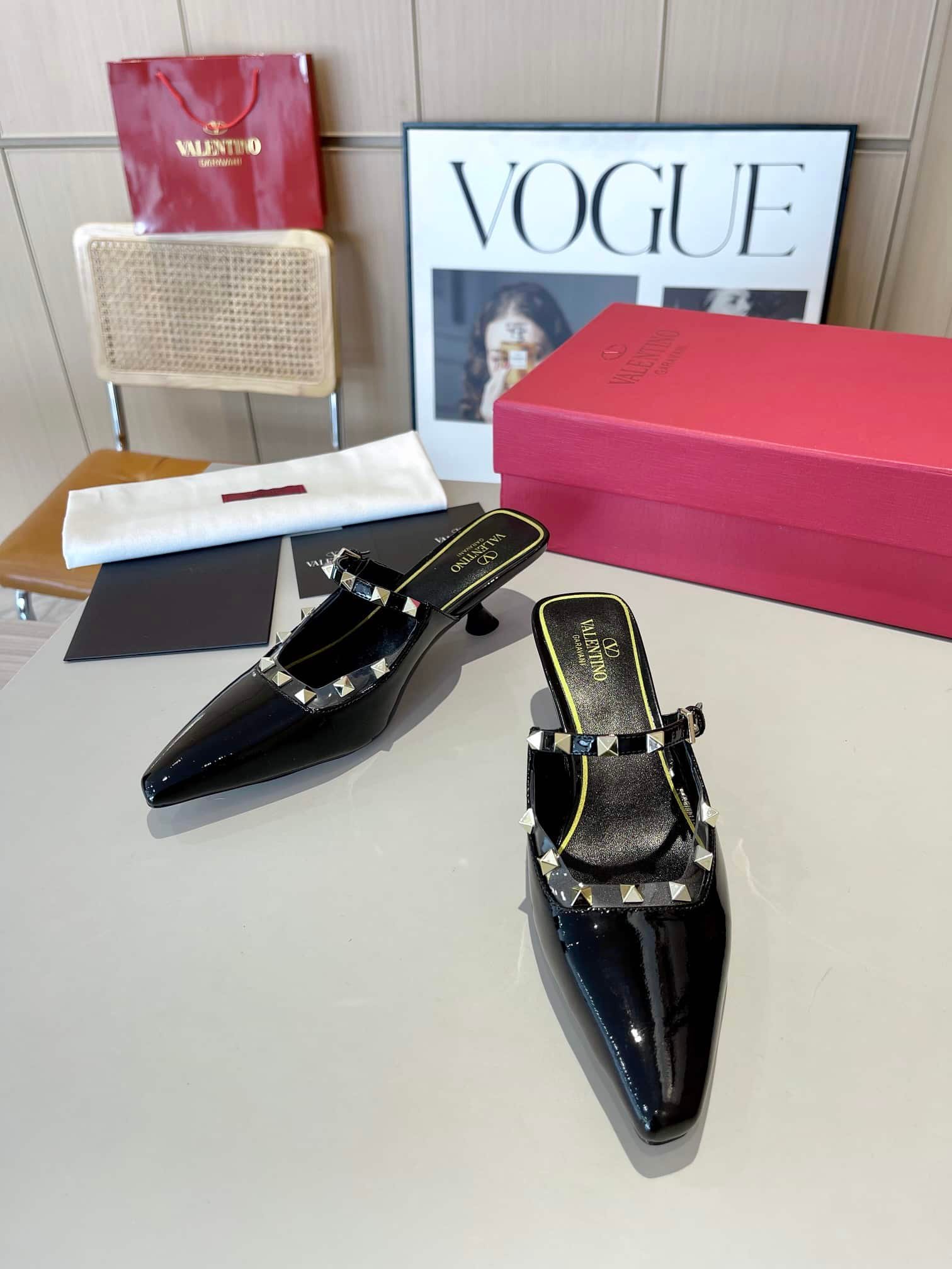 Va1e*ntin0 Garavani Rockstud Asymmetric Patent Leather Mules Black