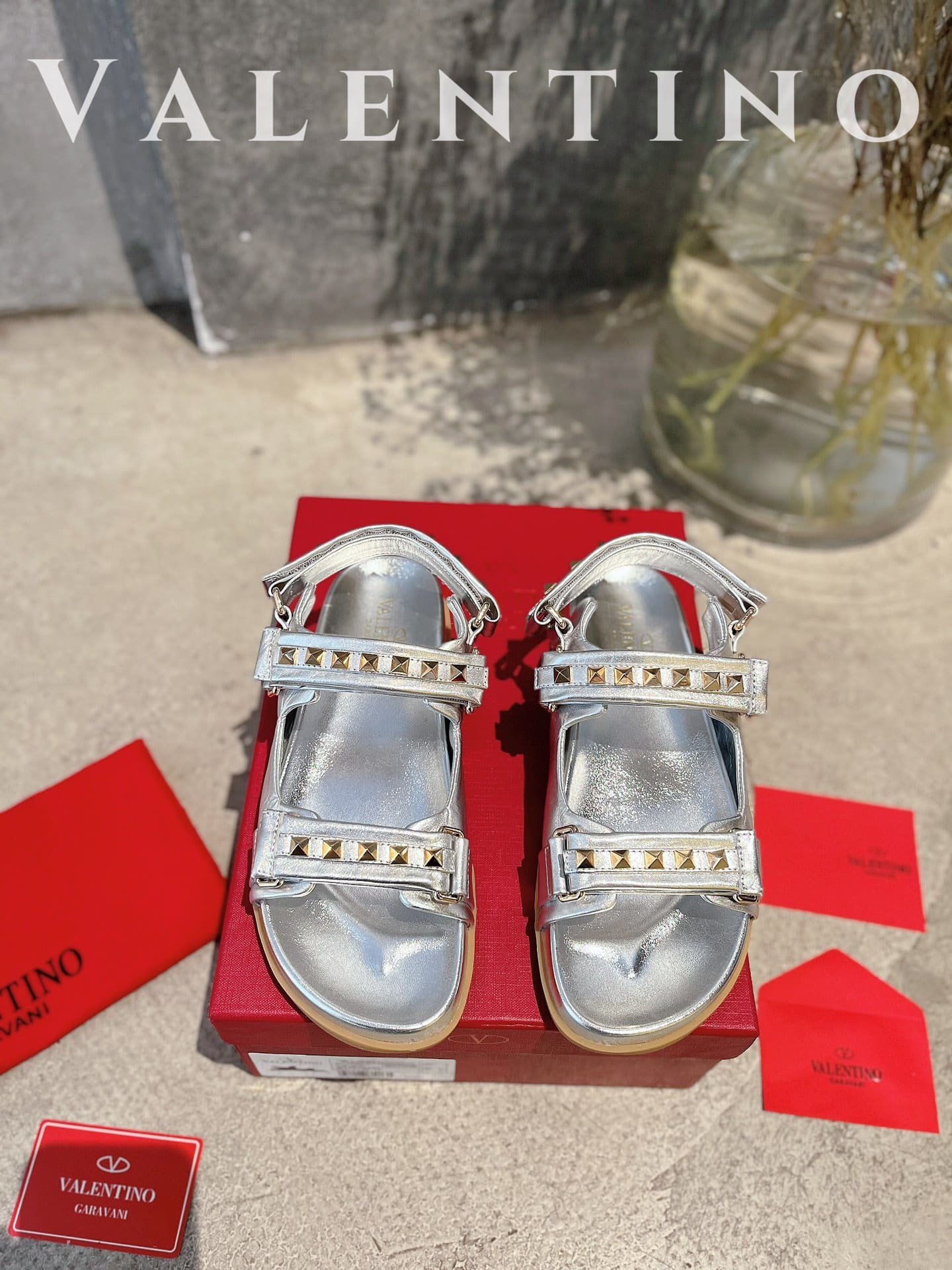 Va1e*ntin0 Garavani Rockstud Flat Sandal In Nappa Leather For Woman In Silver